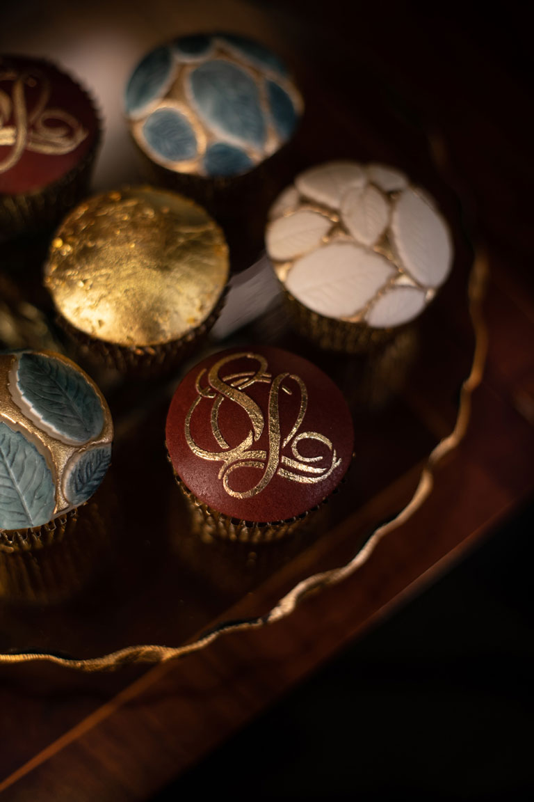 Luxurious cupcakes by GC Couture for The Stafford, handpainted in gold.
